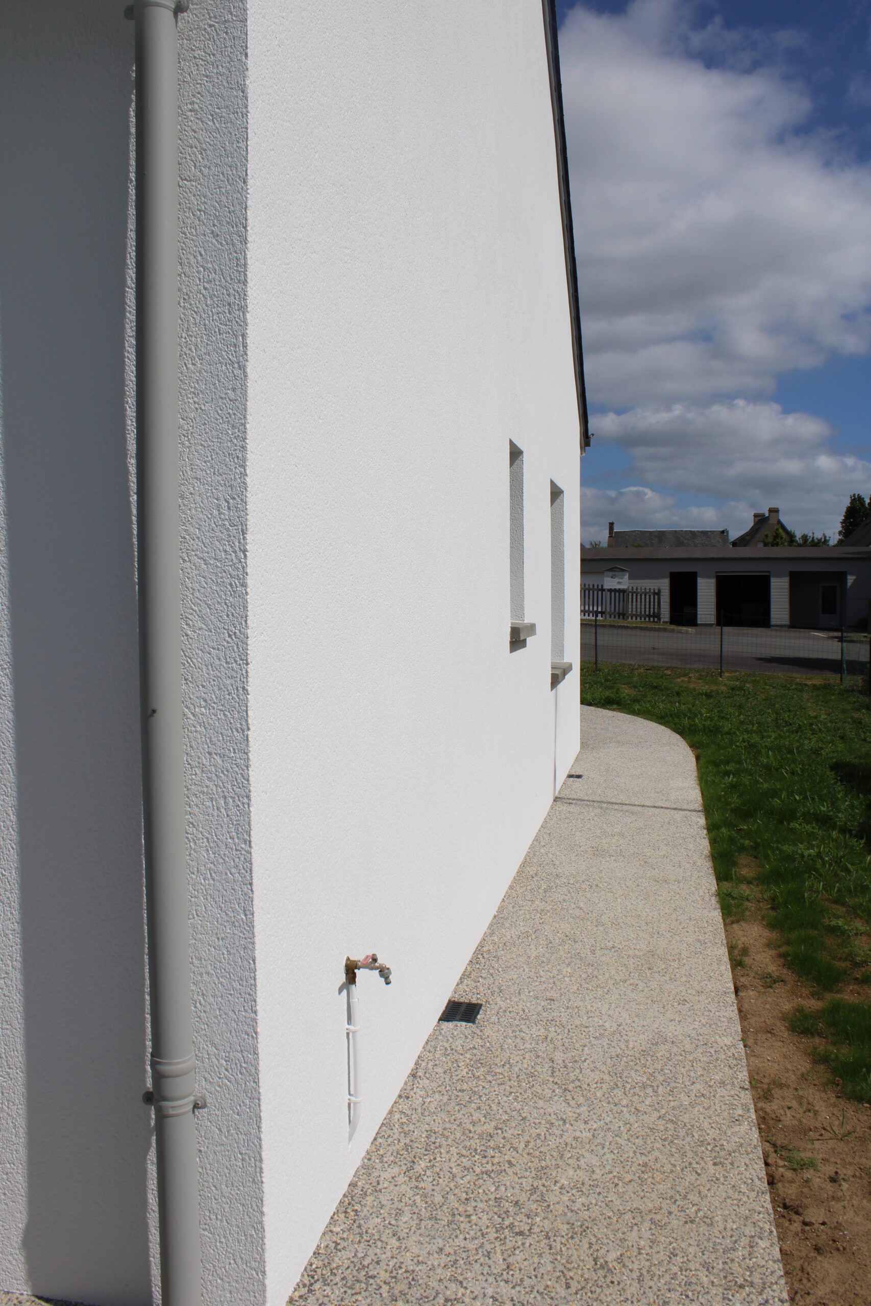Rénovation d'une façade de maison à Le Mesnil-Tôve